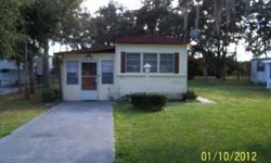 ON A NICE DEEP LOT THAT BACKS UP TO AN ORANGE GROVE. SOME OAK TREES. THIS ONE HAS 3 BEDROOMS. NEWER SPRINKLER PUMP. HAS CENTRAL AIR. ENCLOSED PORCH COULD MAKE A FAMILY ROOM.Listing originally posted at http