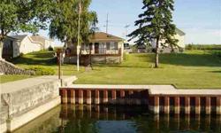 Superior waterfront cottage. This 2 bedroom cottage features an open floor plan with great views of Lake Ontario. There is a loft area that could make a third bedroom or a neat little get-away. The sunroom is open to the house and provides you with extra