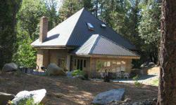 This is a beautiful, custom built home bordering Rush Creek in Lewiston. The setting is among huge tall trees and is surrounded by granite boulders and is absolutely gorgeous as well as very private. The property borders Rush Creek for over 1000' and has
