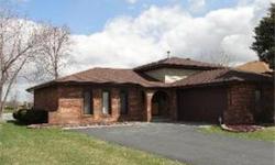 BRICK TRI LEVEL COMPLETELY UPDATED ON THE LAKE! WOOD LMNTE FLRS, LRG EAT-IN KTCHN OFFRS NEW STAINLESS STEEL APPLNCS, STONE BACKSPLASH & C/T , 2 UPDTD FULL BTHS W/ GRNTE AND C/T, LRG FMLY RM W/ BRICK FRPLCE, 3 BRS, VERY LRG LNDRY RM/ UTILITY ROOM W/ NEW