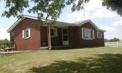 Low Maintenance- brick 3 bedroom home, blacktop driveway, 6 stall horse barn, lg pole barn, stocked pond, small storage shed, 2 1/2 detached garage with workshop on side.
Listing originally posted at http