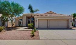 WOW! Move in ready. Home has been remodeled with carpet and paint. Great light and bright kitchen with granite counter tops, island and breakfast bar. Tile throughout all traffic areas. Wonderful built in's, ceiling fans, and arched entry ways. Master