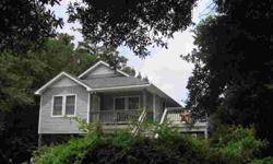 Very charming Outer Banks cottage located in the fantastic community of First Flight Village. This location is central to everything on the Outer Banks! Easy bide ride to schools, parks, sound access. Large storage area on ground level and 2 master