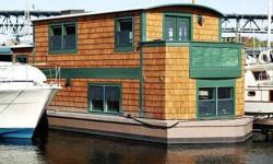 Charming modern houseboat vessel 2008, 38' x 13'.4, 618 sf interior, 198 sf exterior deck, master bedroom on lower level with master bath, large office space. 1/2 Guest bath in entry, combo washer/dryer, living room and kitchen on upper level w/french