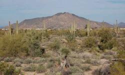 One of few remaining lots in upscale golf course community of Legend Trail. Homesite offers Panoramic Views of Mountains and Pristine Desert. Enjoy Arizona sunsets and views of thousands of acres of State Land plus Continental Mountains to the North, City