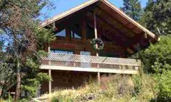 A great place to hang out on Flathead Lake. This log home is ready for you to move in and a great value at this lender pre-approved short sale price. Located on the popular Woods Bay, you have access to water sports, terrific sunsets and a couple of the