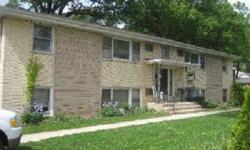 All brick four unit building, 3 two bedrooms & 1 one bedroom unit, LL coin op laundry facilities, newer roof, quiet tranquil setting,Listing originally posted at http
