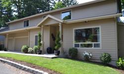This beautiful, well-maintained home built in 2007 is just minutes from downtown in a highly desirable South Salem neighborhood -- privacy abounds! Adjacent to a green belt, it offers stunning views of the West Salem hills.
The gourmet kitchen has