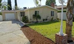 Remodeled home in Sylmar on a good sized lot. Gated entrance with lots of parking. This home features re-textured ceilings, all new interior and exterior painting. Nice open kitchen with refaced cabinets, granite counter tops, & new stove. Remodeled
