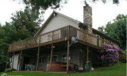 Cozy 3BR, 2-level chalet on 1 acre located in Deep Creek Lake area. Secluded country setting with mountain views. Open floor plan w/ finished family room for extra guests. A great get away property. Storage building, tractor & blower included. Listing