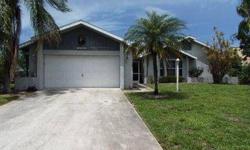 Great Opportunity! Fantastic Lakefront Pool Home! Screened Entry with Double Entry Front Doors. Huge Open Great Room Floor Plan. Lots of Tile, New Carpet, and New Interior Paint. Bright Kitchen with Most Appliances in Place, Pantry, and adjacent Informal