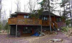 SPLIT ROCK RESORT- 2-story cottage with extensive stone work and many windows makes a light, bright home. Features 3 bed/2/5 bath, master bedroom with fireplace, living room with fireplace, family room. Hardwood floors, kitchen, dining room & more. Lots