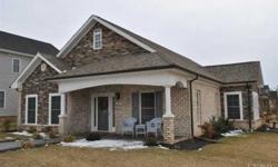 Similar to photo. Ease of living home featuring a brick, stone and vinyl shake/siding exterior with connected garage for two cars including a no step entry and an enclosed storage space. Tina Friar is showing this 3 bedrooms / 2 bathroom property in