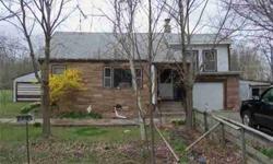 Hey, Where else could you buy a house on 3.3 acres with a 2 car detached garage in the country? Listed way below assessment. Septic updated approx 5 years ago. Ceiling and wall damage was from when the roof leaked before it was fixed. House needs a lot of