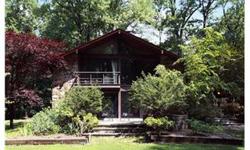 Serene luxury in historic Snedens Landing this extraordinary property is a distinguished mid century home taking in nature's wooded beauty and lush gardens abutting 600 acre Tallman State Park. Clean architectural lines coexist with curves and angles that