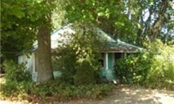 Located about halfway between Corvallis & Eugene, approximately 200 ft. of river frontage on the Long Tom River. Older home, needs updating, about 2/3 of an acre. Has potential. Will not finance as is. Great project for contractor or ??? Nice shop. Benton