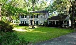 Traditional Elegance! Gorgeous 1.77 acre lot with pond frontage on quiet street. Classy light & bright interior with gleaming wood floors, custom closets, chair-rail, & custom plantation shutters! Huge greatroom with fireplace, large dining room,