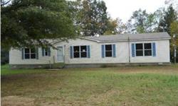 COUNTRY LIVING - This 3 BR, 3 BA manufactured home features eat-in kitchen, dining room, large family room, and covered rear deck. All on approx. 9.3+/- acres. Property is offered as is with all faults, no post-closing repairs or payments will be made for