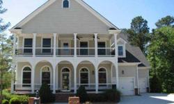 Gorgeous Charleston style home in sought after, lovely, peaceful, swim and lake community. This massive four bedroom, four bathroom beauty has all the amenities, hardwoods throughout the main floor, two double sided fireplaces, gourmet kitchen, large