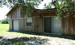 This 1 bedroom, 1 bath, 1 car garage home is located in Hudson, Florida. The property is situated on a corner lot that is MOL 6.89 acres located at the intersection of Hudson Avenue and Dream Oak Drive. The home has clay tile flooring throughout all