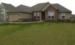 Brick ranch thats to die for! 3 beds plus den! Dining room with cufferd ceiling, great room has 12 ft ceiling and gas fireplace. Granite counters, tile backsplash and stainless appliances. Maple cabinets. Hardwoood floors, raised flower bed. Custom