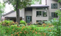 Lovely and unique 3 level split on gorgeous lot near Bald Eagle Lk.Vaulted, great room, 2 fireplcs, mature trees, creek, 4 perennial gardens, possible 4th BR, laundry on upper level, nice windows in lower level, beautiful views.
Listing originally posted