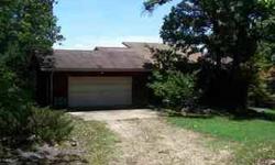 End of the road 3 bd 2 ba Norfork Lake home on 16 ac joining the govt strip north of Henderson. 24 x 23 garage on main level with a garage door into the unfinished basement also. Excellent deer and turkey hunting. This would make a great horse property