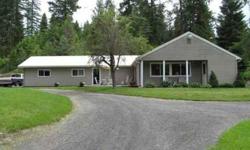 Beautiful rancher on 24 acres with year round creek. 24x48 3 bay shop with loft. Great horse or cattle land. 3 large bedrooms. Great room concept. Propane fireplace in the living room and a woodstove in the dining area. Eating bar in the kitchen with a