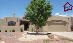This stunning Southwestern home was built with quality and detail in mind. It features 3 bedrooms, 2 baths, a split bedroom floor plan, large living room with fireplace, beautiful kitchen with granite counters and lovely backsplash, huge utility room and