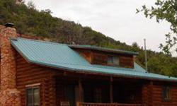 Amazing Log Cabin in the Mountains above Paragonah! Sits on 28 acres with a stream running thru the property, a separate bunkhouse (200 sq ft.) with water and woodstove. Main cabin has propane lights, range, refrigerator, water heater, covered deck, metal