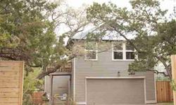 Charming townhouse/condo with tree house feel Like a house by itself, one of 2 units on 1 large lot, own entry, driveway, yard, & address.Two car garage w/opener, New up & down covered decks, paint & privacy fences in a setting of mature oak trees and