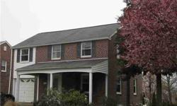 Well-maintained 3 BR, 2 bath brick colonial in desirable Woodmere Park located near schools, track, tennis courts, library and shopping. This home offers newly refinished kitchen and breakfast room (created by using 1/2 garage) with two pantry closets and