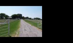 Country living but close to town! Approx 36+- acres with 3 ponds, barn, and large brick farm house. Property is fenced, crossed fenced, 20x30 storage shed, 20x40 oder barn with 5 stalls Co-op water but also has a water well. Elec gate and pipe fencing