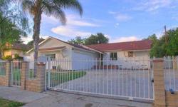 Beautifully remodeled gated home in great area of Pacoima. Lots of parking inside of the gates. Featuring