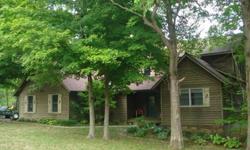 Big, beautiful cottage in the woods. Four bedroom home built by Rich Carlson has three floors of great space, lots of storage and a terrific view from the back deck. Kitchen recently updated and freshly painted 1st floor. Well-maintained and included over