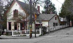 One of Nevada City's most significant Historic Structures. Home of first non-native Nevada City resident Charles Marsh. 7 separate offfice spaces, in choice downtown location; on-site parking and adjacent to large city parking lot. Original architectural