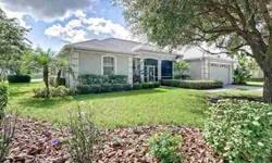 GREAT HOUSE, GREAT VIEW, LOW PRICE! Wonderful Florida Living with Solar heated Pool & large Lanai overlooking Beautiful Lake. Immaculate, Freshly painted, Custom-built home. Looking for a larger garage? This one is 27' deep.Open spacious kitchen with