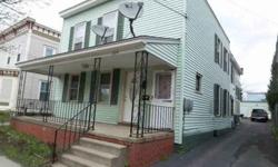 Great owner occupied or investment property with good off street parking and 3 car detached garage. Many improvements including roof, windows, kitchens, and bath! - shows well! Currently owner occupied. Good storage for both tenants. Pride of ownership