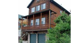 Gorgeous lake and foothills views! Overlooks Horsetooth Marina and Inlet Bay. Contemp custom log home with open floor plan. Great Room has 12 ft vaulted ceilings & river rock fireplace. Hardwood floors throughout main level. 3rd bdrm(or could be office)on