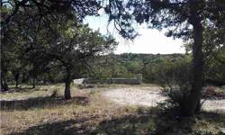 Great double lot close to Lake Travis waterfront, over 1/2 acre dotted with mature trees, mostly level, with hill country views and 2nd story lakefront views. Has nice stone and wrought-iron partial fence. Waterfront park with swim dock and boat ramp