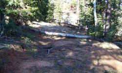 0.37 acre Zion View Mountain Estates lot with a very gentle south slope, with water certificate and water tank on the lot. This property has a nice 10 foot X 20 foot storage shed with a 54 inch wide door to store your equipment. A level RV pad ready for
