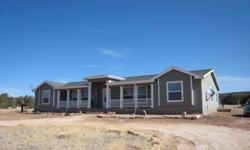 Spacious four-bedroom home on 19.541 gorgeous acres with wide open spaces and mesa views. Only five years old, this property has an open split floor plan with large master bedroom with walk-in closet, attractive bath with separate soaking tub and shower,