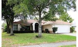 Short Sale. Attractive 4/3 POOL home near WEDGEFIELD GOLF COURSE! Very OPEN floor plan with LARGE living room and SEPARATE dining room space. Rich TILE floors. Beautiful kitchen with GRANITE counters, CRISP clean cabinetry. Breakfast bar. Pantry. SPACIOUS