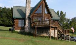 Beautiful log home with mountain and river view. 5,6 acres with a pond stocked with bass, crappie and sunperch. Partially fenced for livestock. Quiet country setting. Very private. Across the street from the beautiful Hiwassee River. 3 miles to the boat