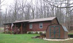 Incredible Log Home in Rural Carroll County, move in ready with amazing features. 5 Bedrooms - 3 on the main level including master, wood burning fireplace and Cast Iron Pellet Stove, open floor plan surround by hardwood flooring. NEW Features Include -
