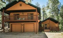 Just in time for summer! This Groom Creek executive retreat is move-in ready and being sold completely and beautifully furnished. Youll appreciate that its so secluded and BORDERS THE PRESCOTT NATIONAL FOREST. The back covered patio is enhanced by the gas