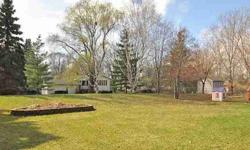 Spacious Up-to-date Home on Private Treed Lot! Updates include