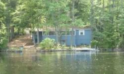 Almost year round seasonal -Pawtuckaway lake waterfront - 91ft waterfront, dock, and sandy swimming on kid friendly no wake Neals Cove. Three bedroom septic design-1996 installed! Large screen porch. Paved driveway.In 2006,insurance claim rebuilt the