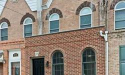 A Rarely Offered Completely Rehabbed 3 Bedroom Home on One of the Most Sought After Blocks. A Gorgeous New Brick Facade with Arched Windows enhanced by Granite Steps leading to a Light Drenched Sun Room. A Lovely Spacious Living Room with high ceilings,