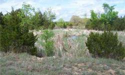 7 ACRES m/l of land that is mixture of pasture and woods. Has paved access on 2 sides, both Highway 72 & CR 5285. Pond included. Some restrictions apply.Listing originally posted at http